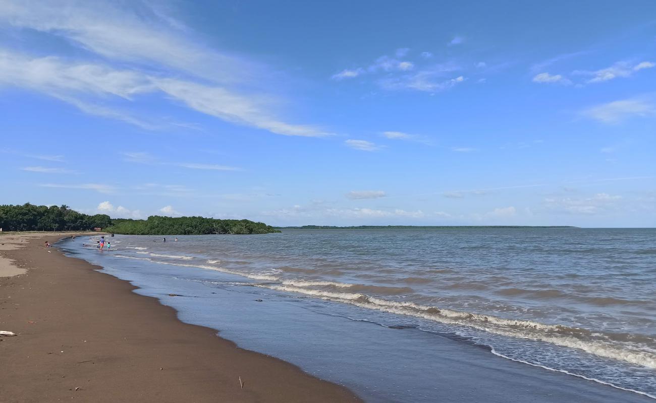 Photo de Salado Beach avec sable brun de surface