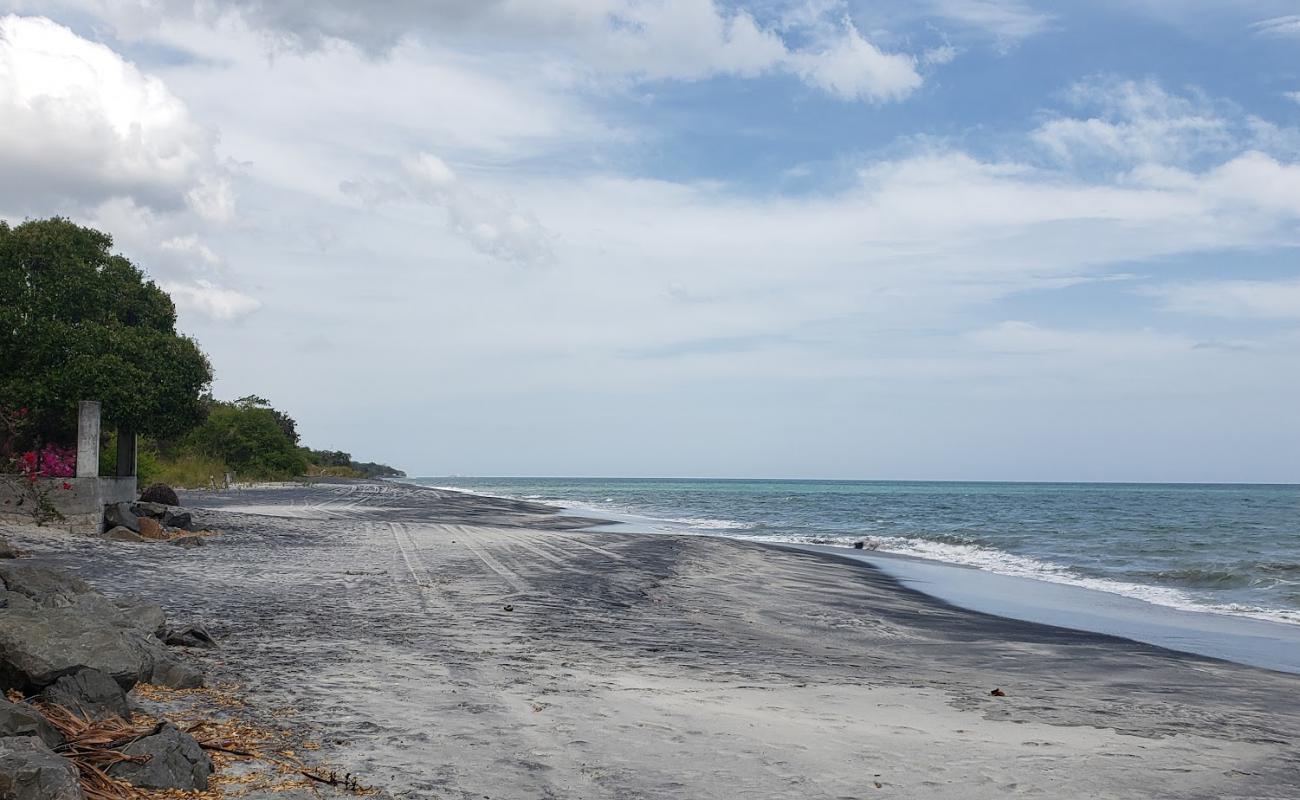 Photo de Juan Hombron Beach avec sable gris de surface