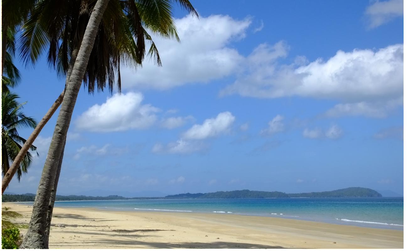 Photo de Tagpis Beach avec sable fin et lumineux de surface