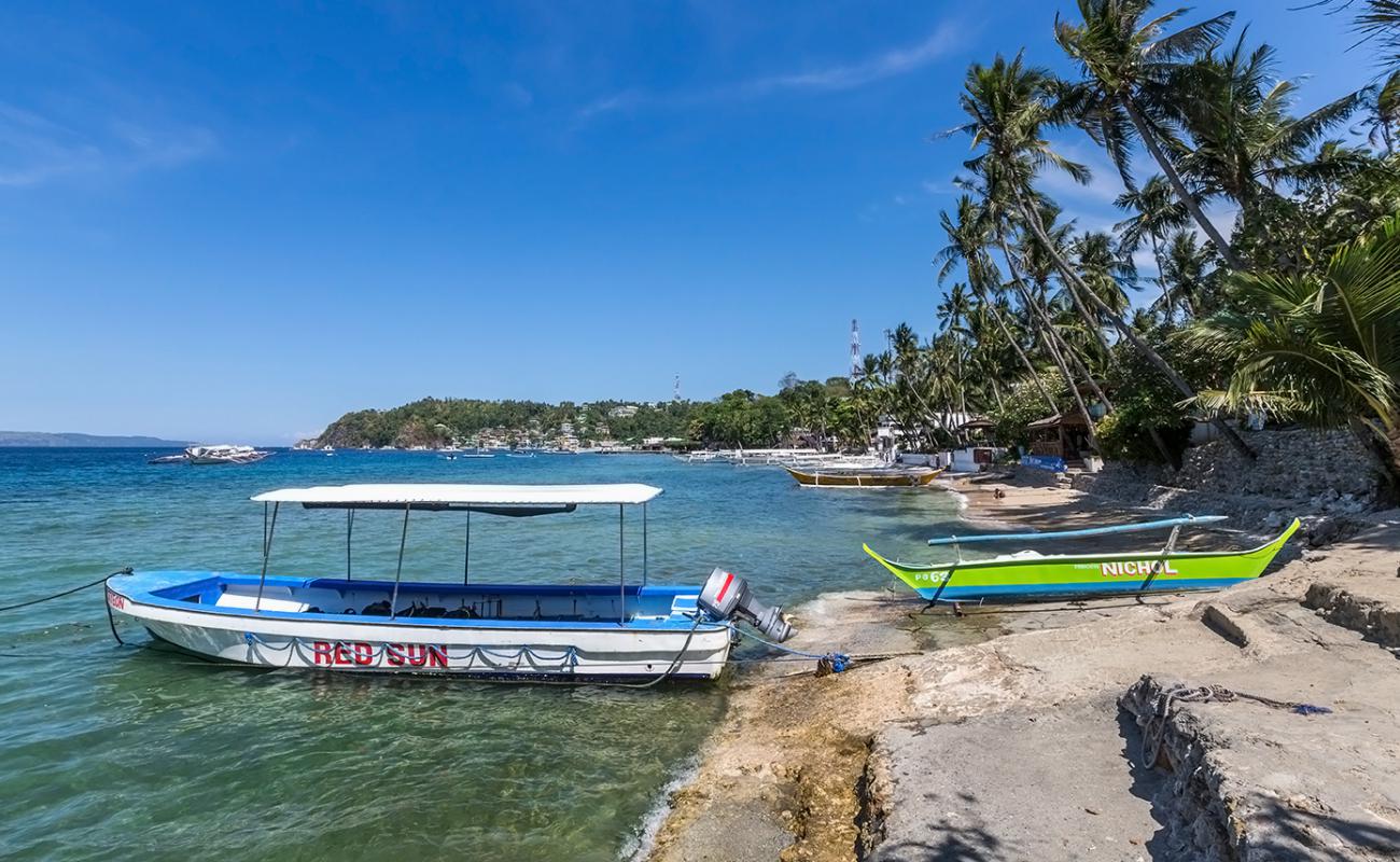 Photo de Sabang Beach avec sable gris de surface