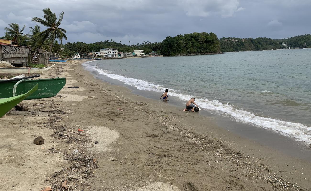 Photo de Hundura Beach avec sable gris & galets de surface