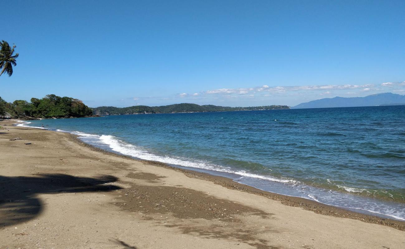 Photo de Dulangan Beach avec sable gris avec caillou de surface