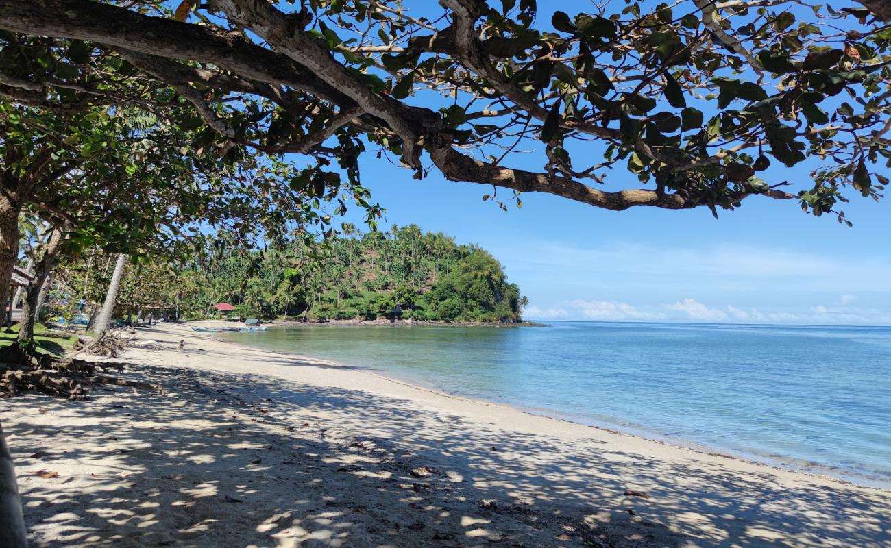 Photo de Tagumpay Beach avec sable lumineux de surface