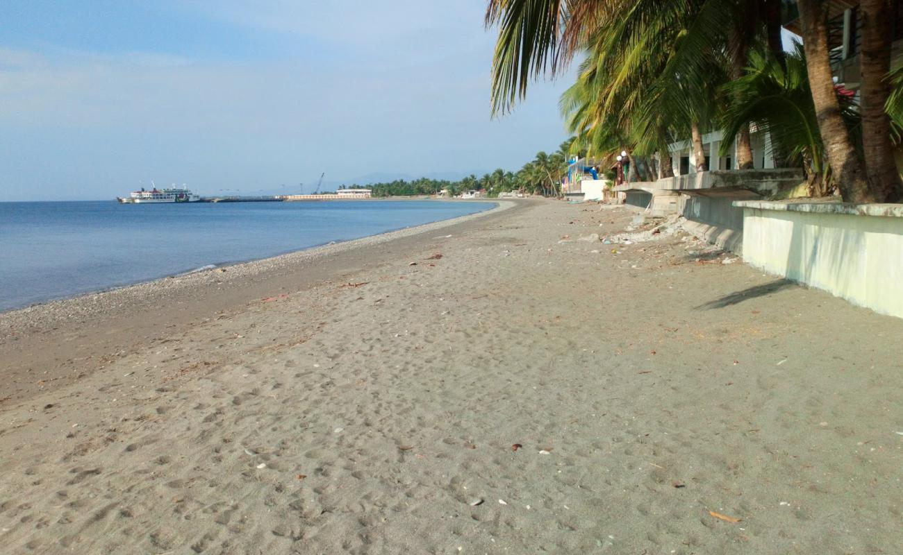 Photo de Nelia's Pandan Beach avec sable gris de surface