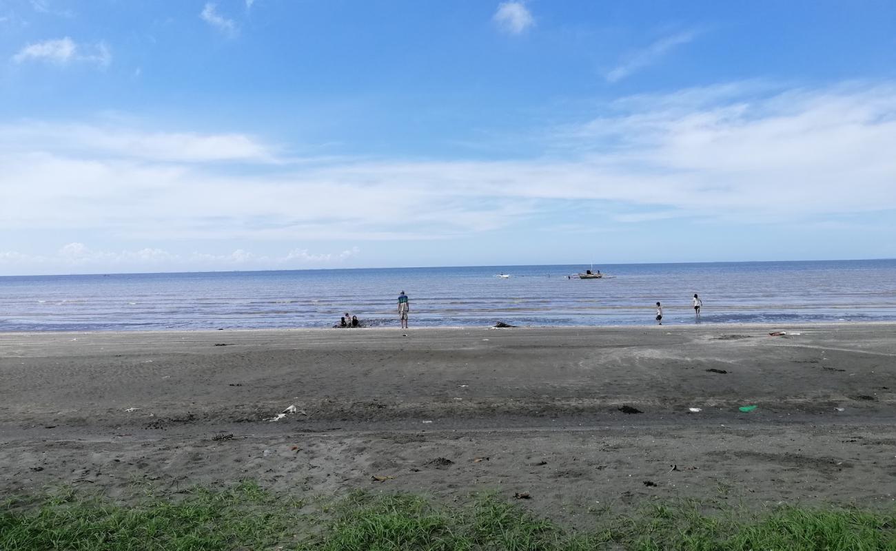 Photo de San Enrique Bay Beach avec sable gris de surface