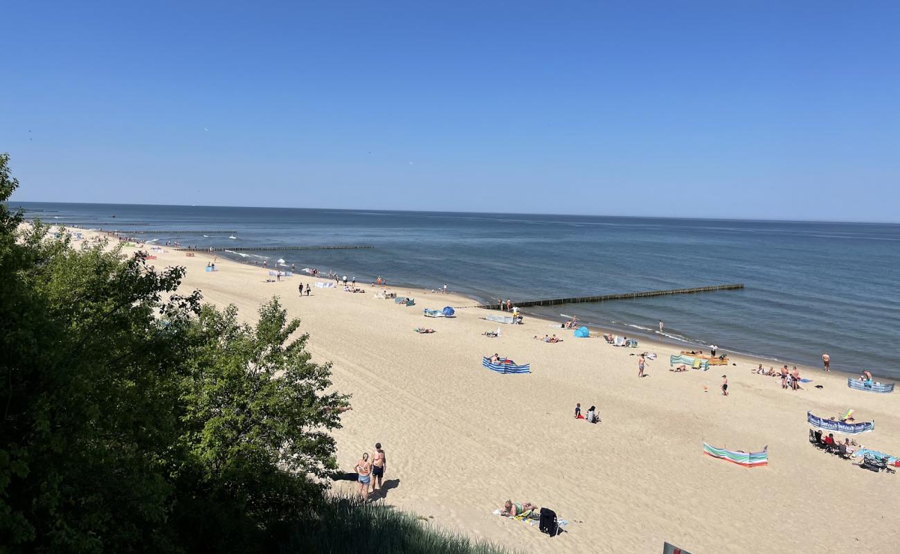 Photo de Rewal Beach avec sable beige de surface