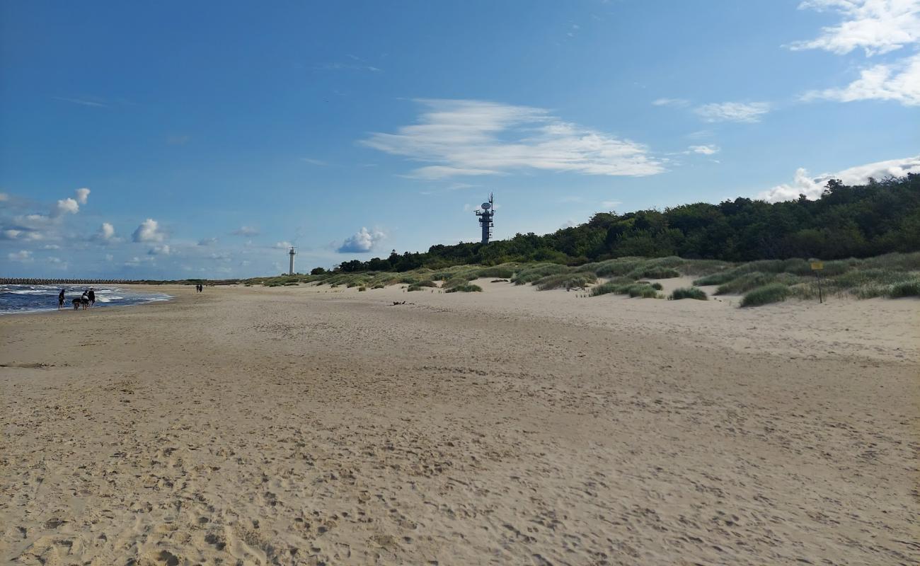 Photo de Zamknieta plaza avec sable beige fin de surface