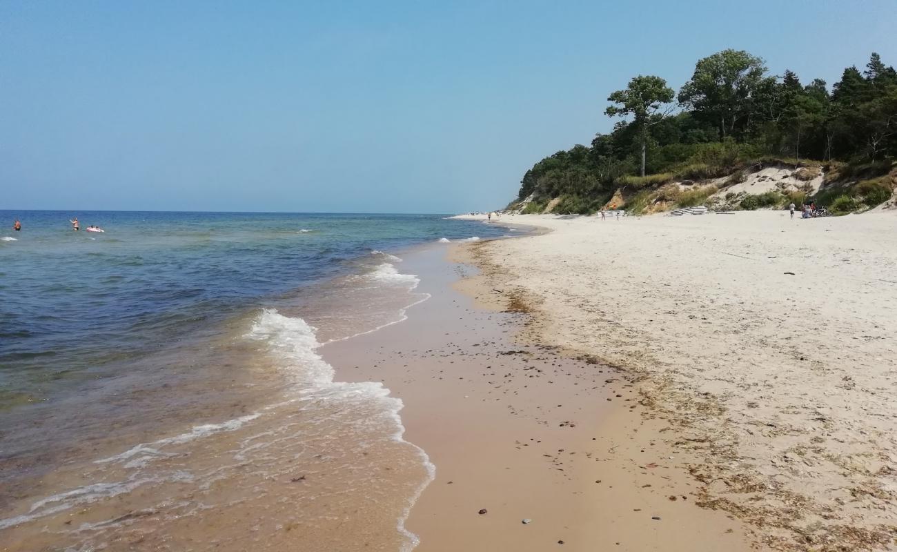 Photo de Plesna Plaza avec sable lumineux de surface