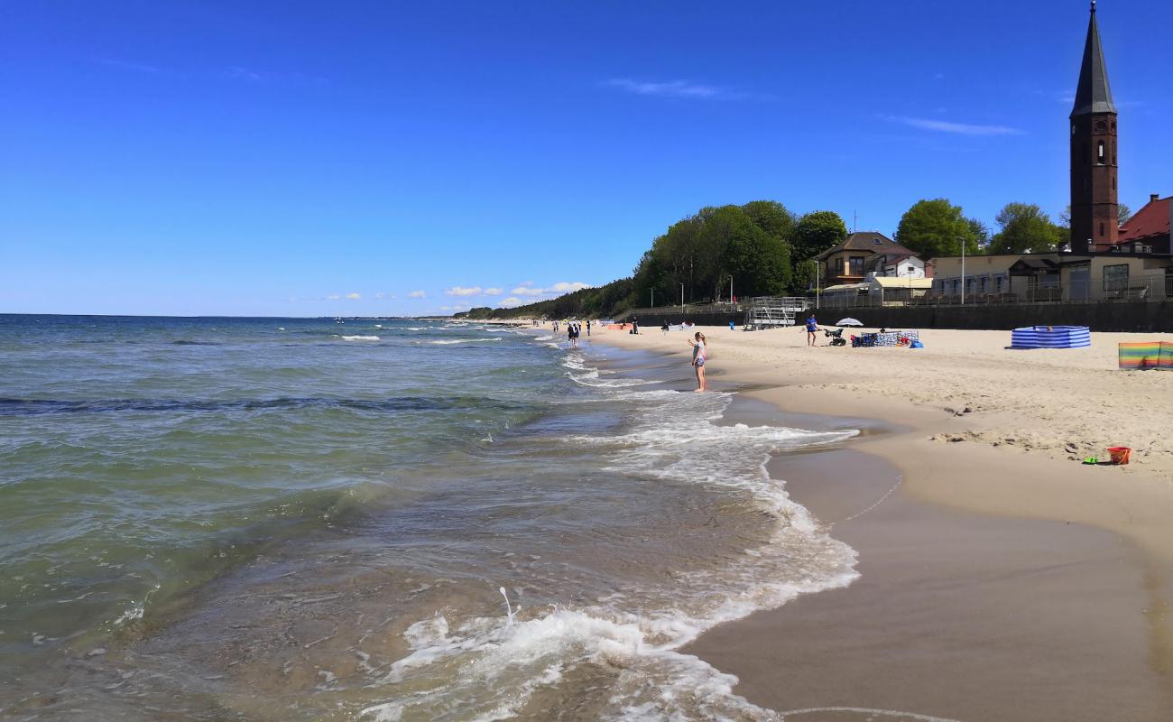 Photo de Sarbinowo Beach avec sable lumineux de surface