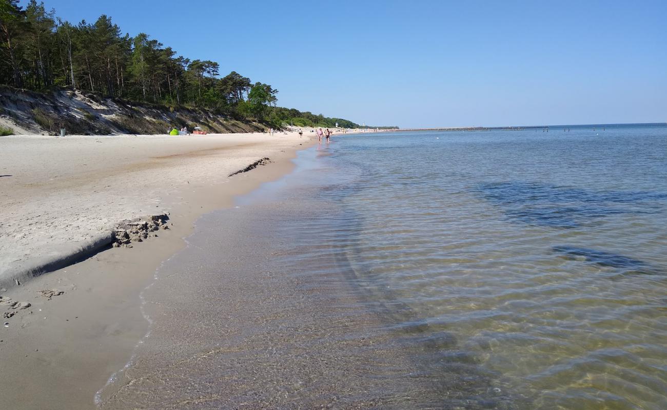 Photo de Ustce Beach avec sable lumineux de surface