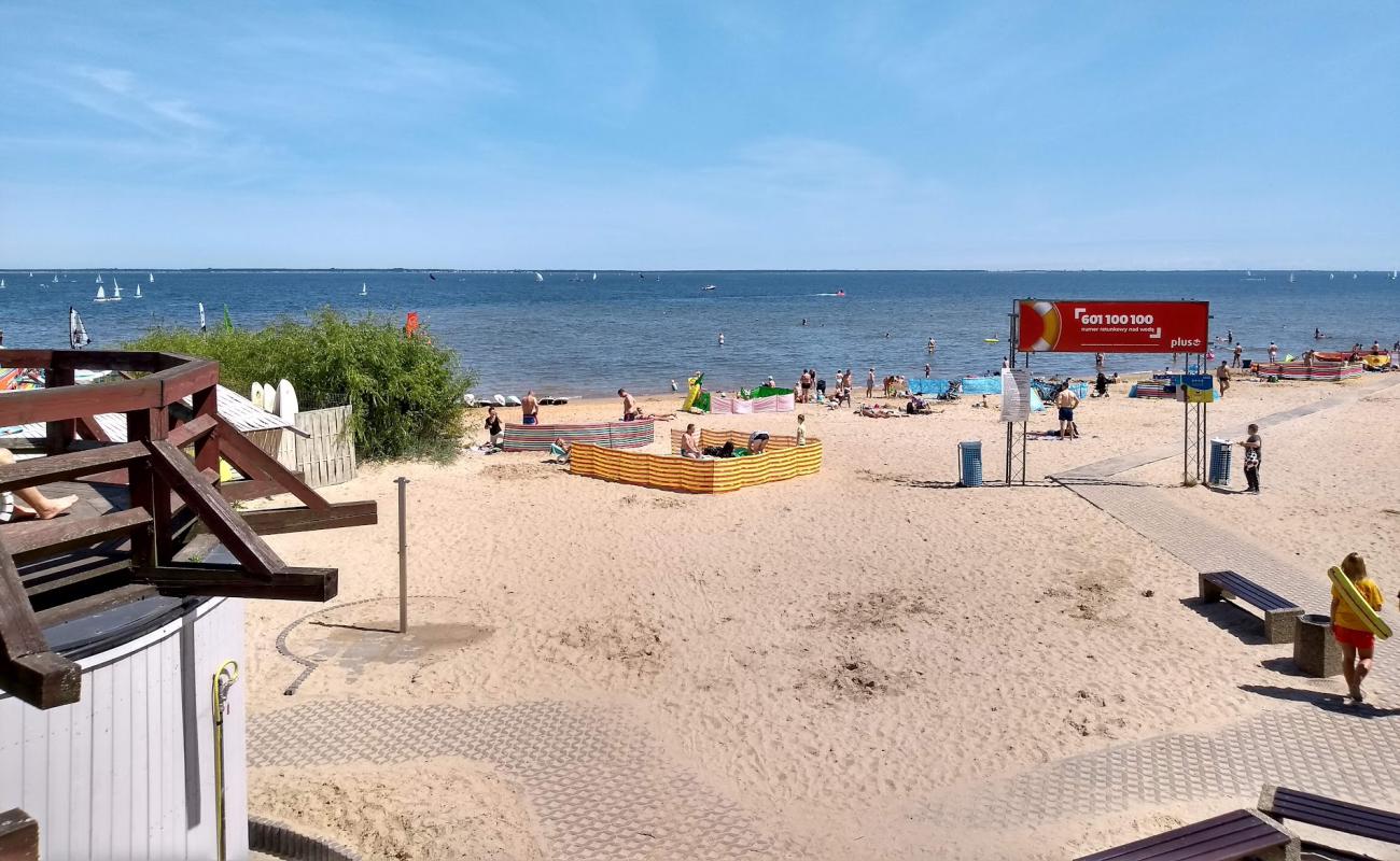 Photo de Puck Beach avec sable fin et lumineux de surface