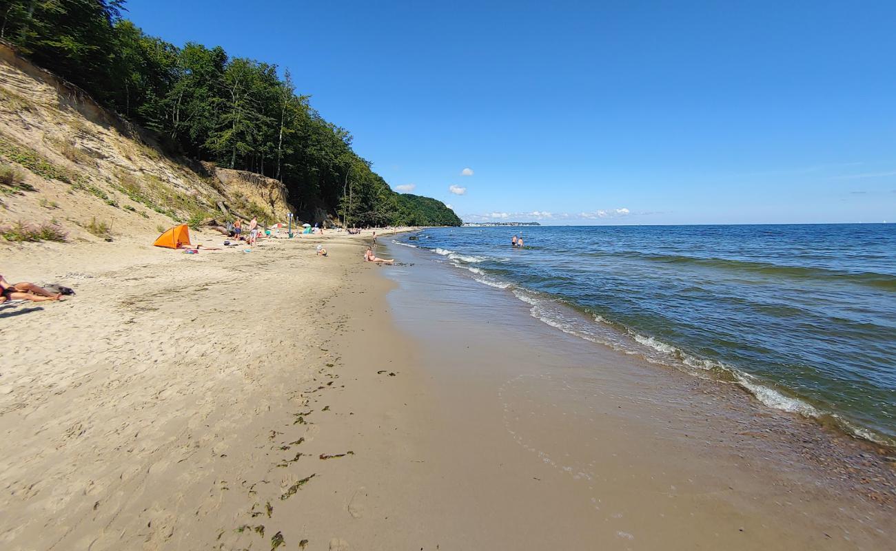 Photo de Redlowska Beach avec sable lumineux de surface