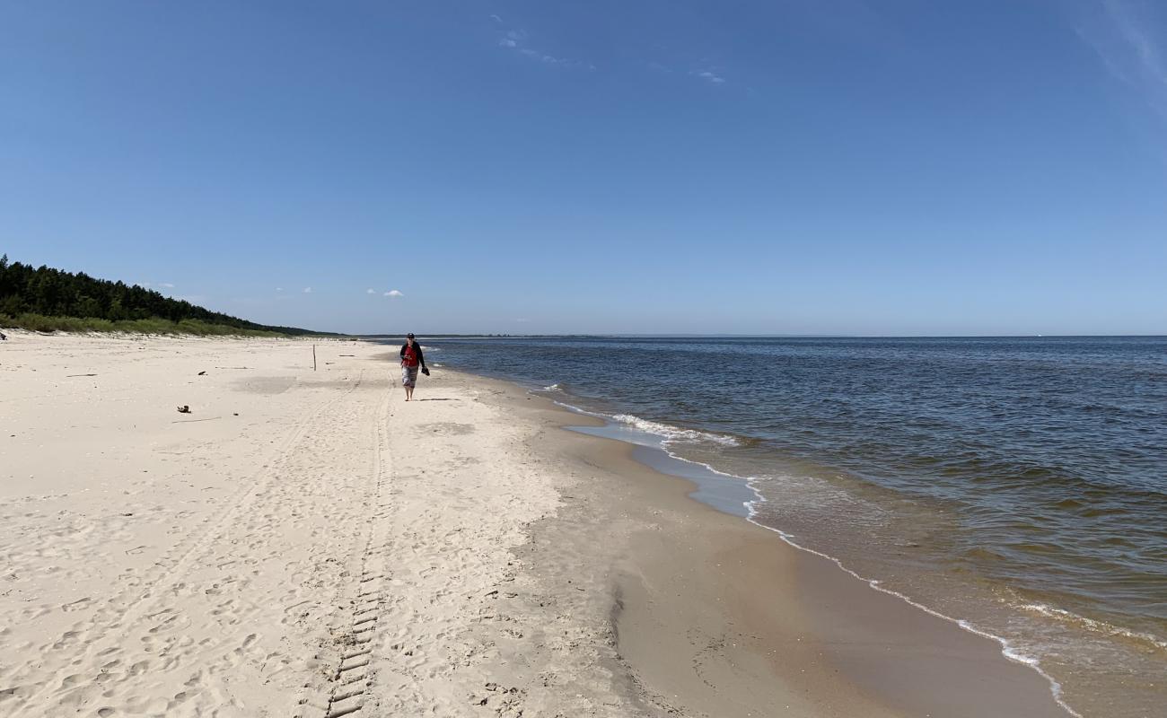 Photo de Junoszyno Beach avec sable blanc de surface