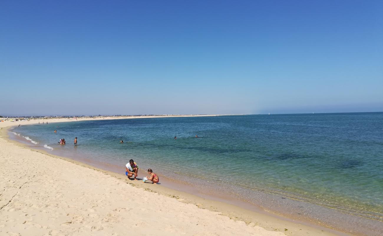 Photo de Ilha da Armona Mar avec sable fin et lumineux de surface