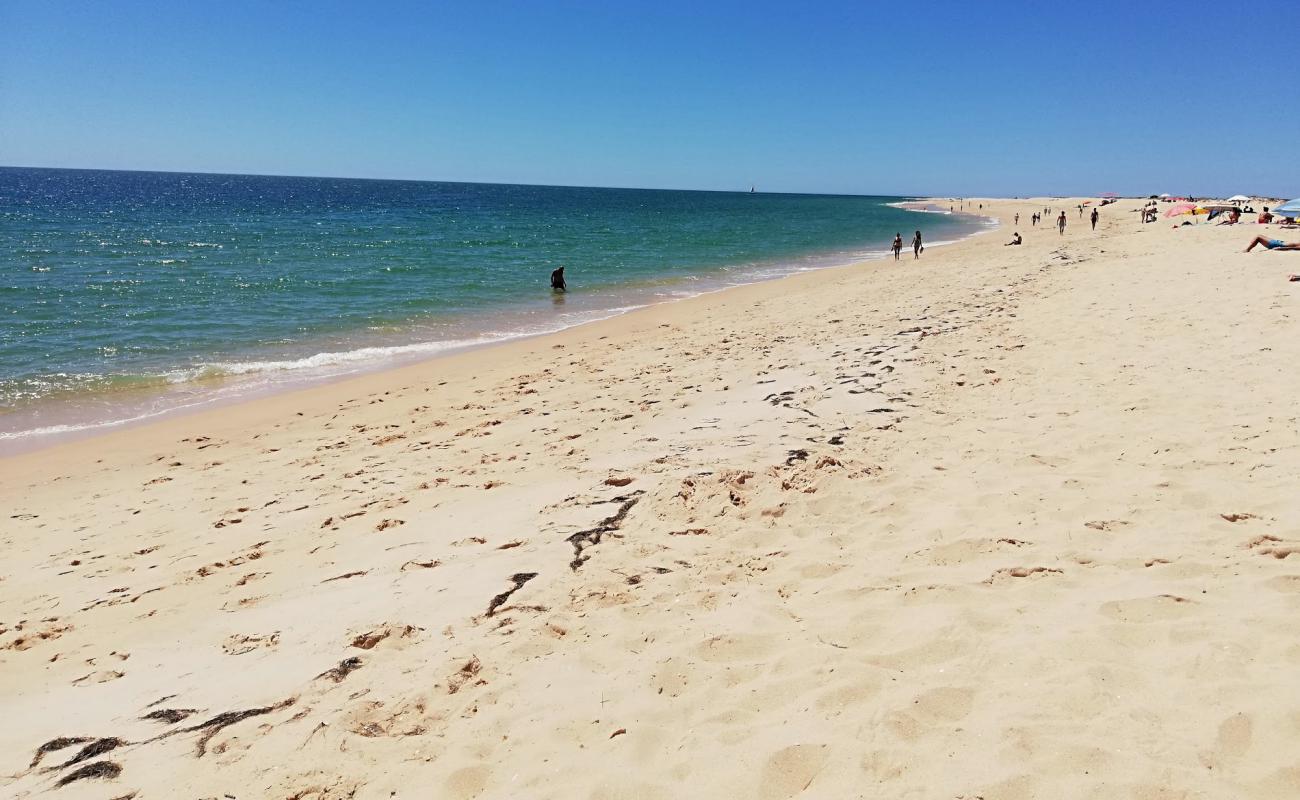 Photo de Praia da Barreta-Mar avec sable fin et lumineux de surface