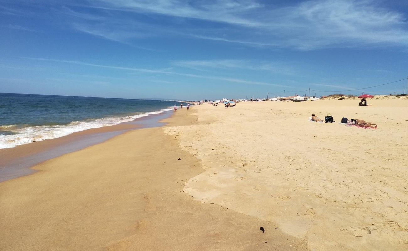 Photo de Plage de Faro avec sable fin brun de surface