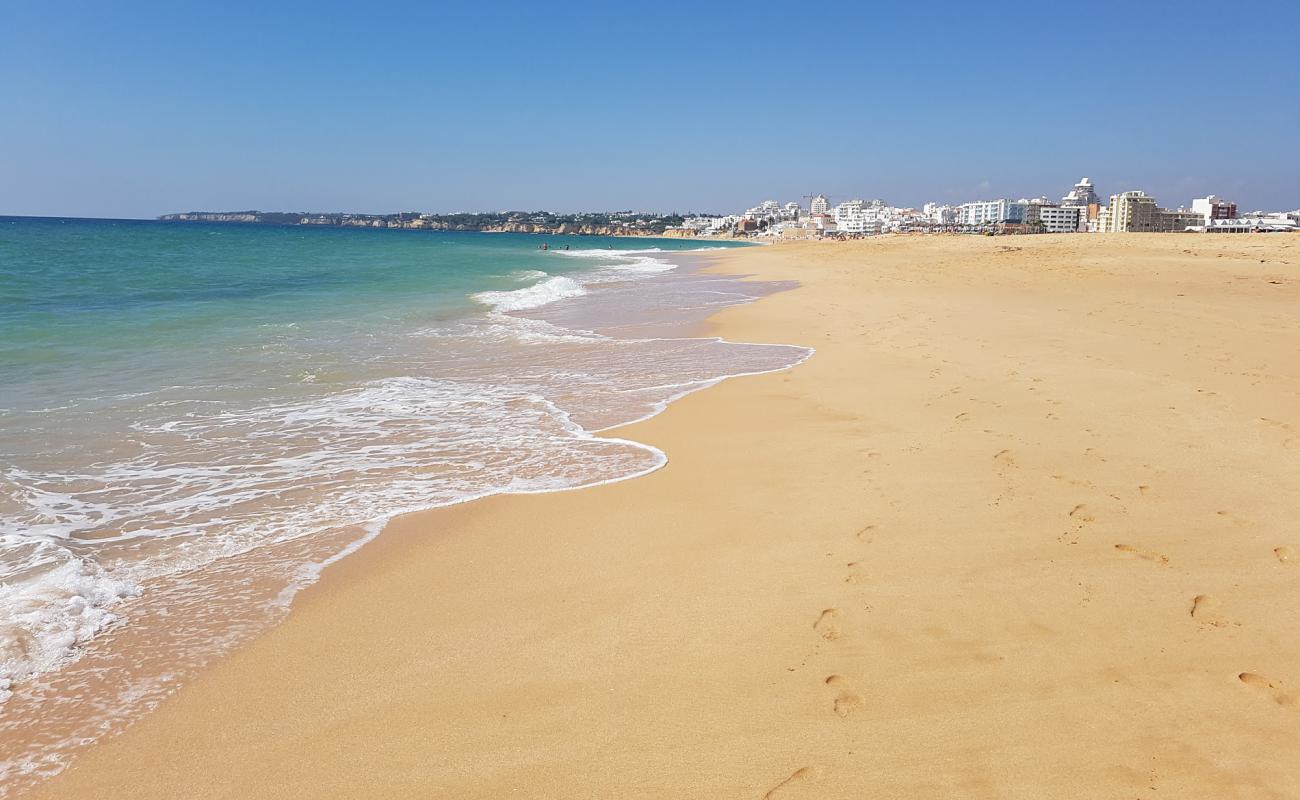 Photo de Armacao de Pera avec sable fin brun de surface