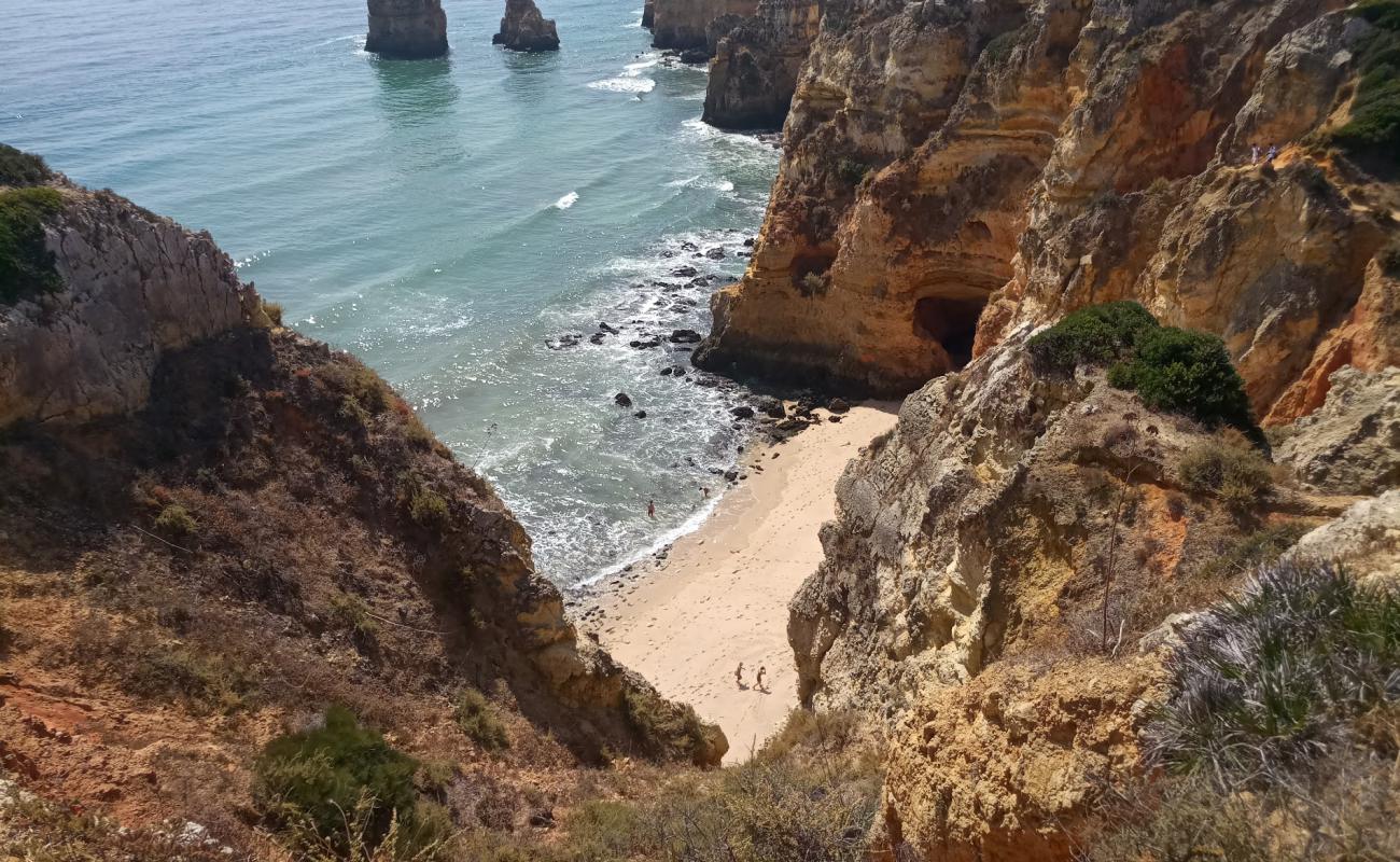 Photo de Praia da Balanca avec sable fin et lumineux de surface