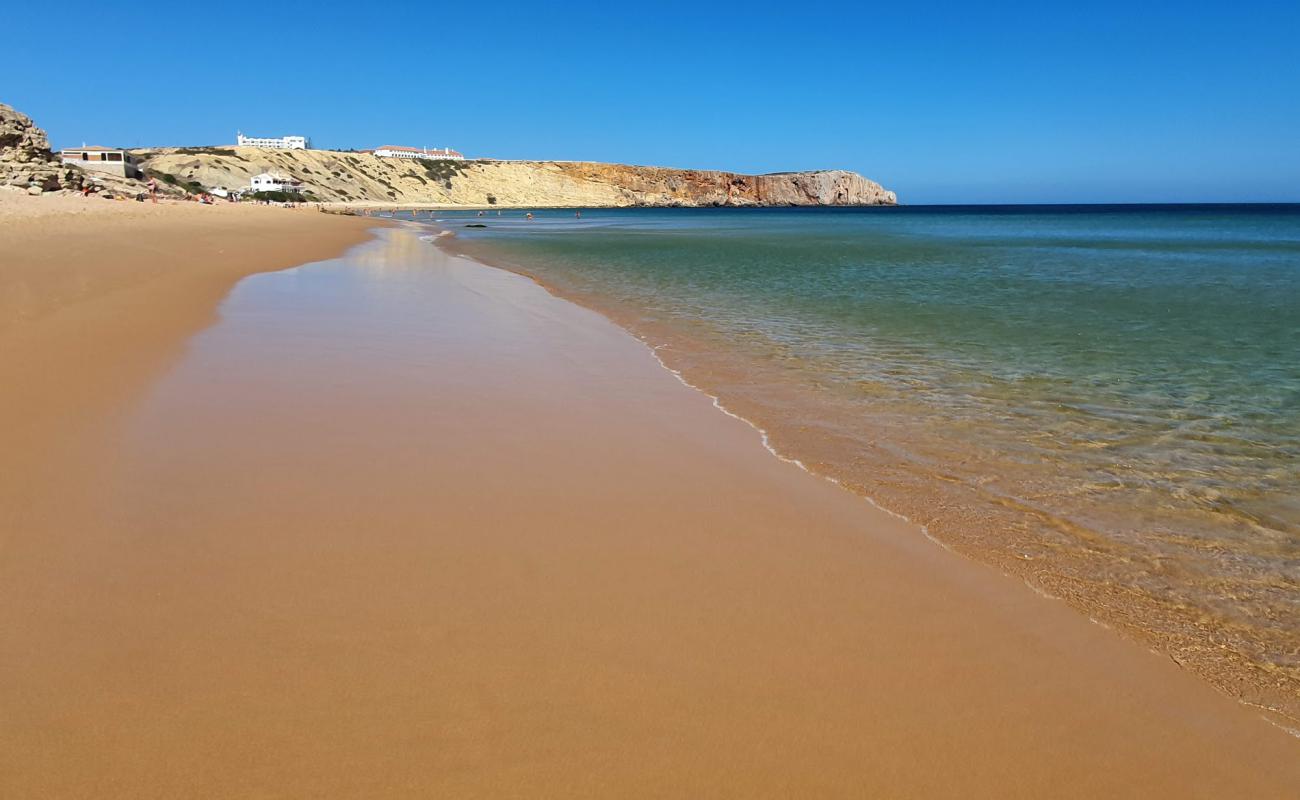 Photo de Praia da Mareta avec sable lumineux de surface