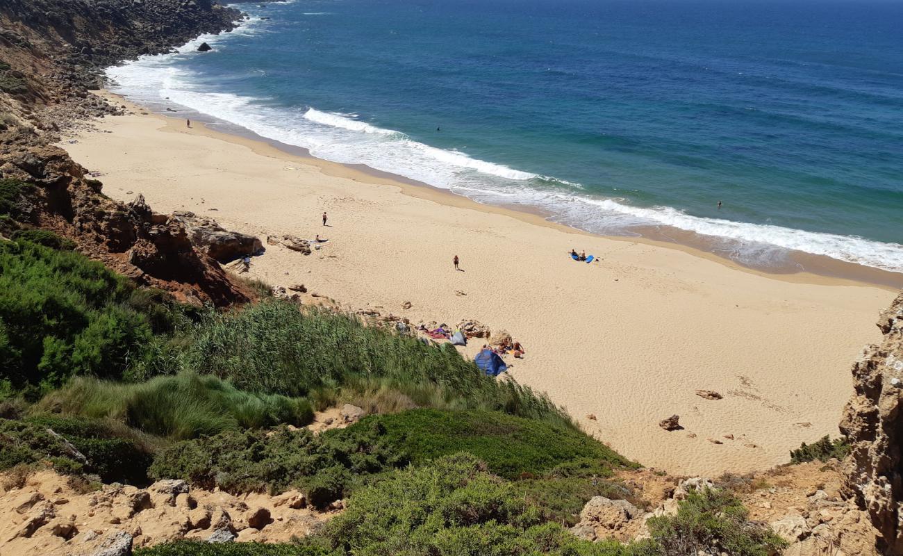 Photo de Praia do Telheiro avec sable brun de surface