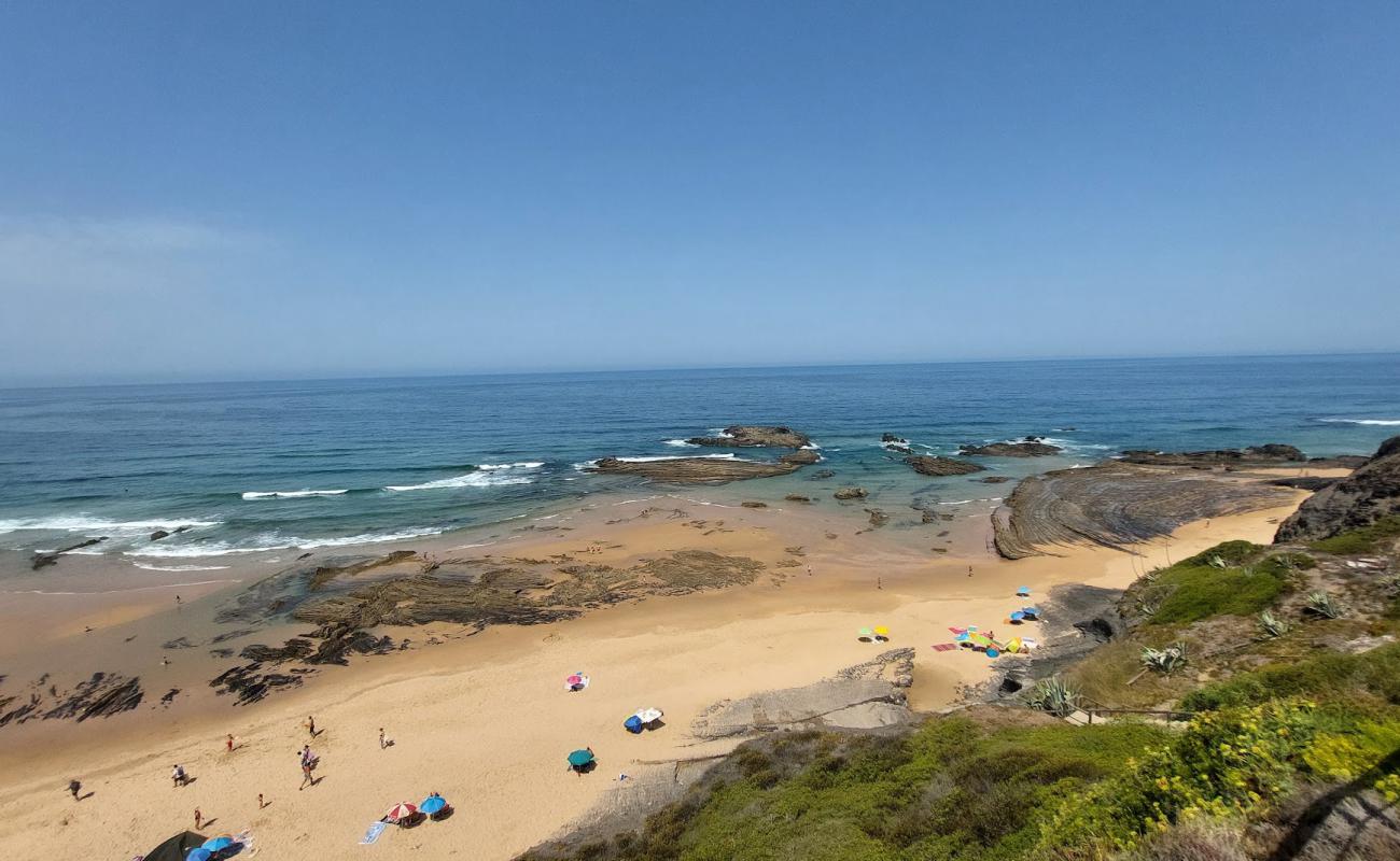 Photo de Praia da Carriagem avec sable lumineux de surface