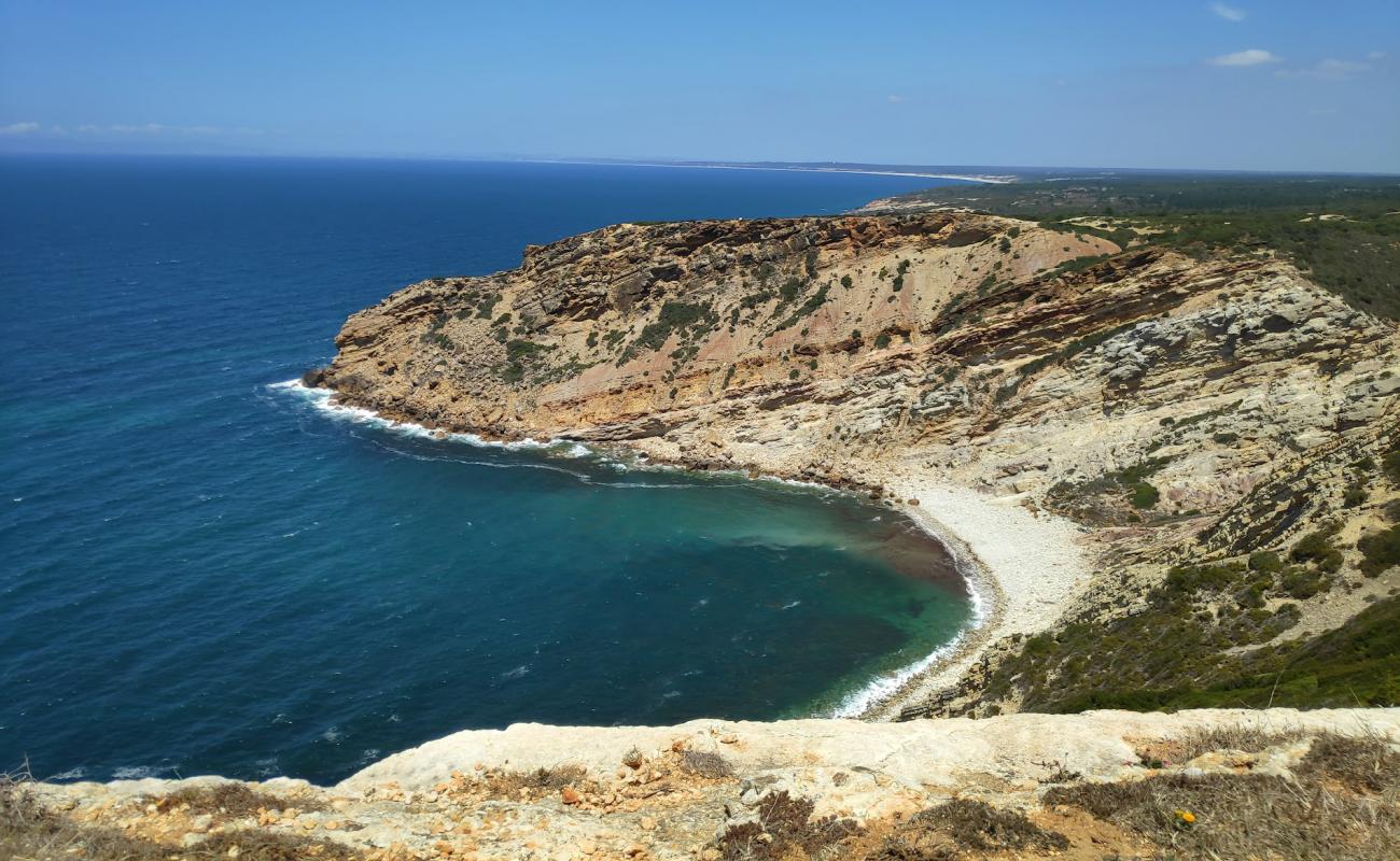 Photo de Praia dos Lagosteiros avec terrain rocheux de surface