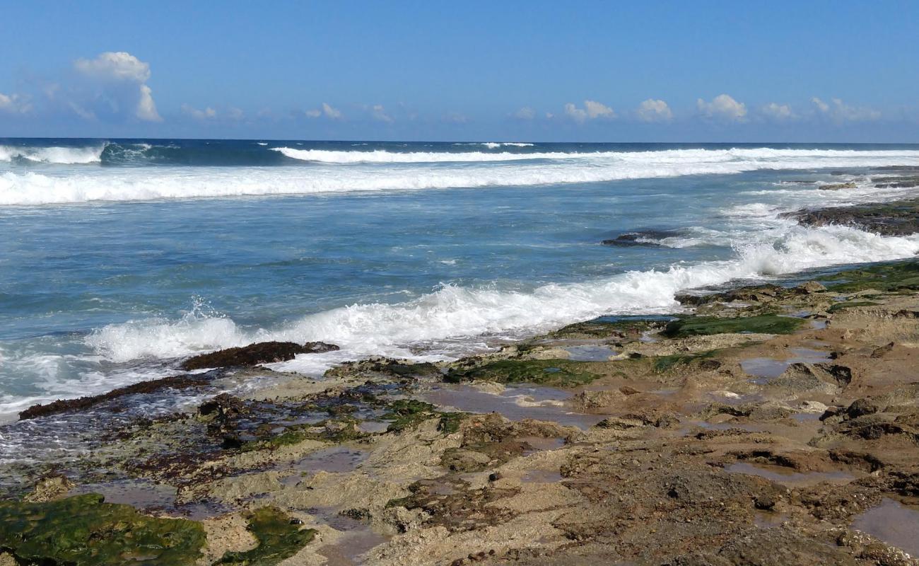 Photo de Los Almendros beach avec roches de surface