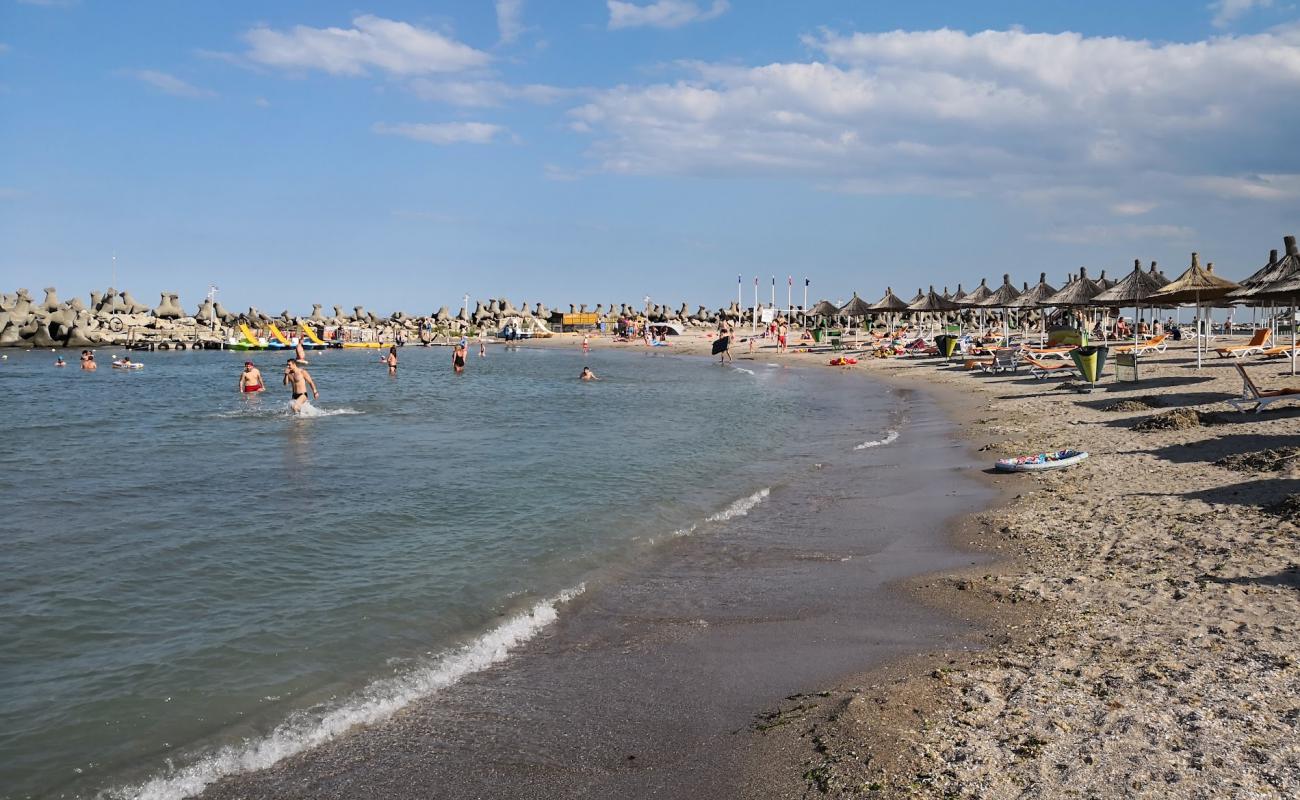 Photo de Saturn beach avec sable lumineux de surface