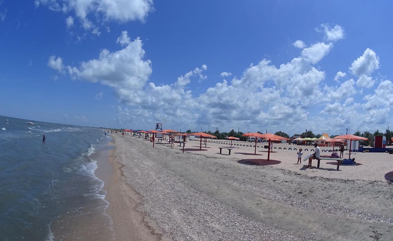 Photo de Oazis Beach avec sable coquillier lumineux de surface