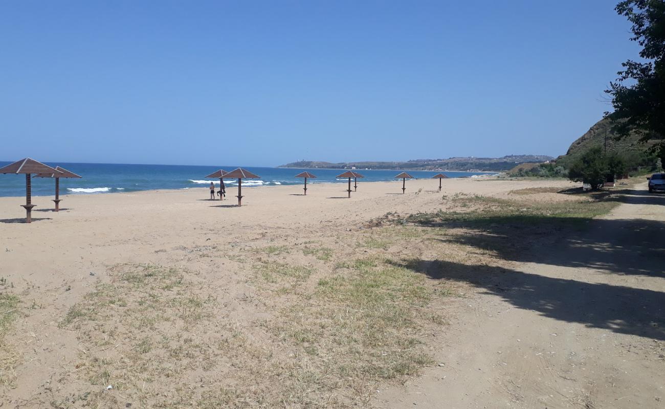 Photo de Terek Beach avec sable lumineux de surface