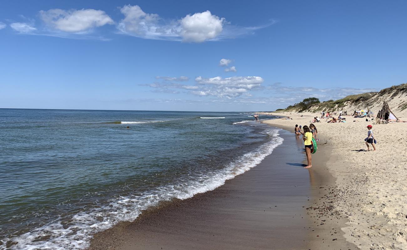 Photo de Efa beach avec sable lumineux de surface