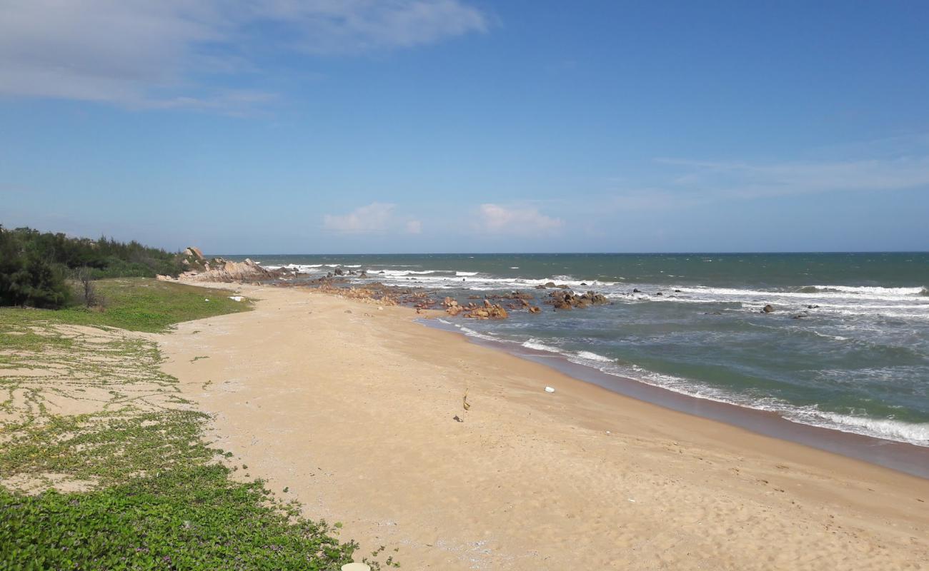 Photo de Peaceful Resort beach avec sable beige de surface