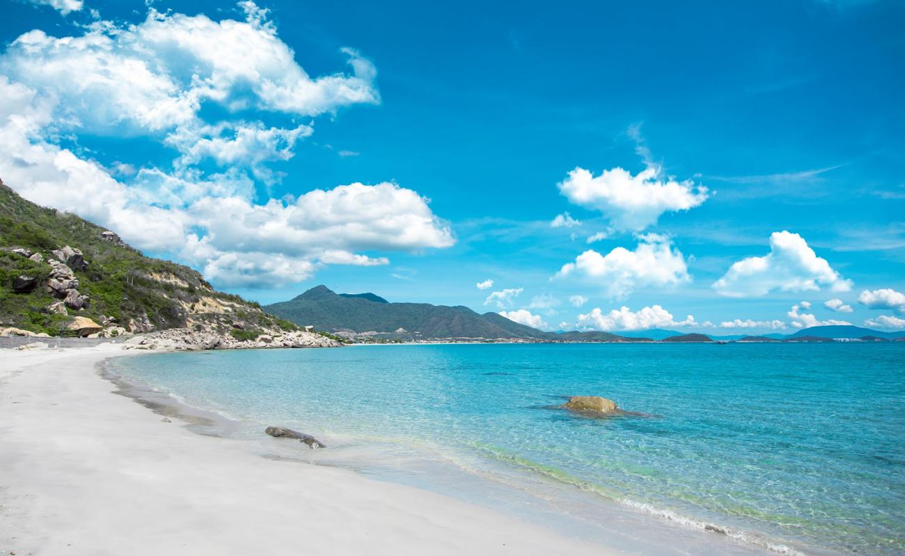 Photo de KDL Ganh Nhay Beach avec sable brillant et rochers de surface