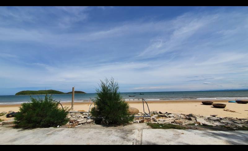 Photo de Shi Hai Sea avec sable beige de surface