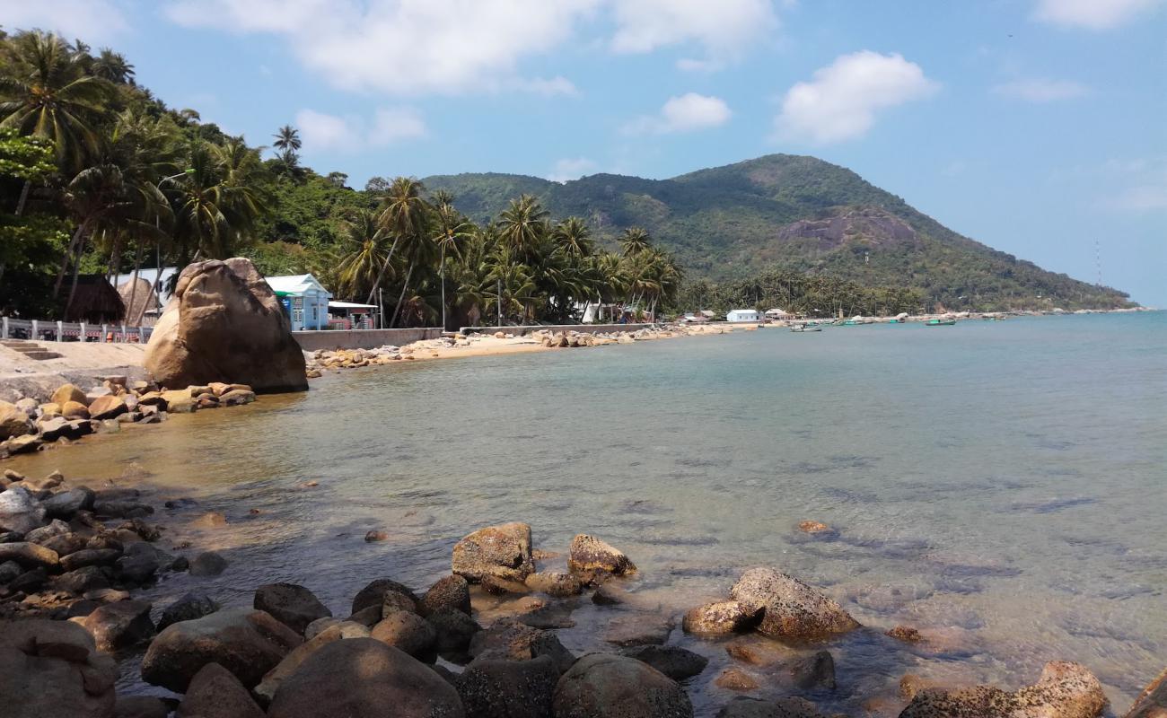 Photo de BaiBo Beach avec sable beige & pierres de surface