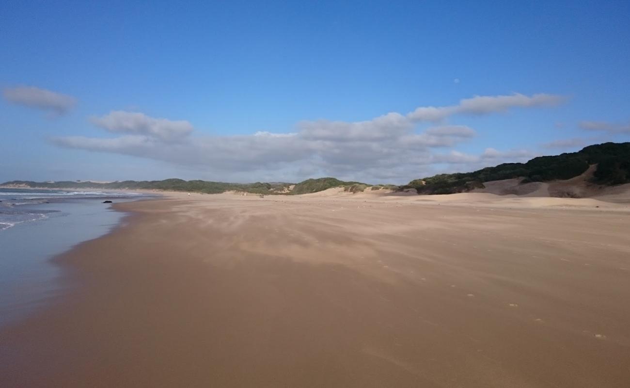 Photo de Begha Mouth beach avec sable beige fin de surface