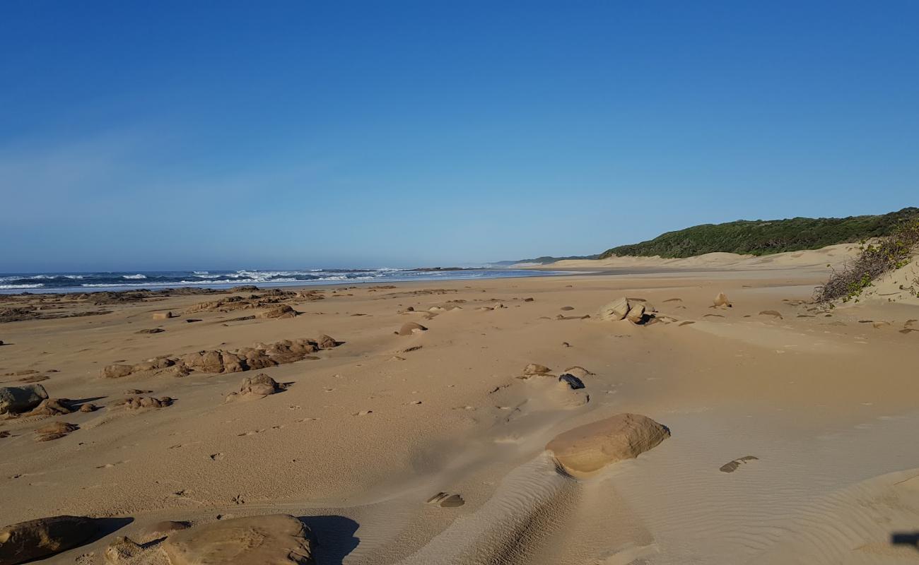 Photo de Kaysers beach avec sable beige & pierres de surface