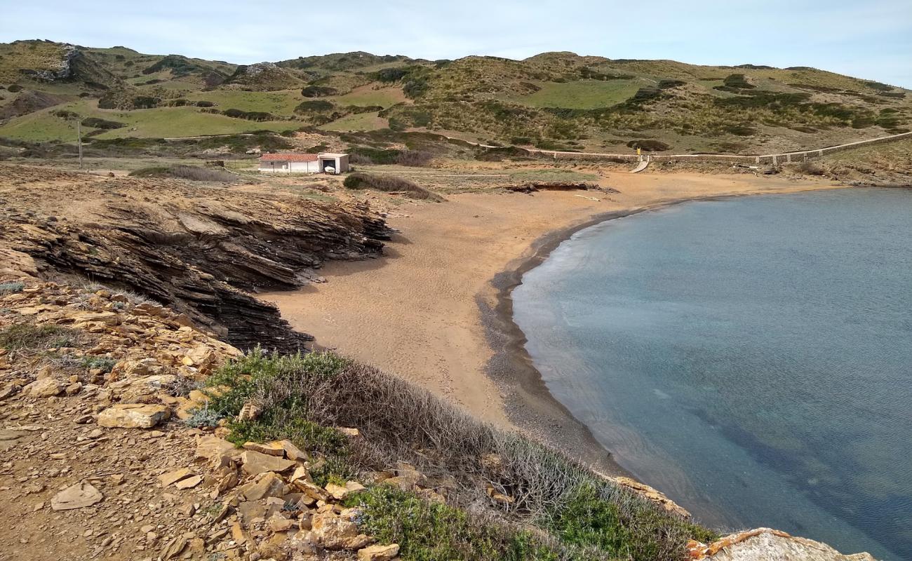 Photo de Cala Mica avec sable brun de surface