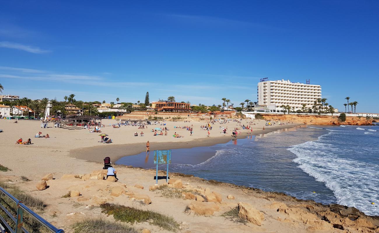 Photo de Playa la Zenia avec sable brun de surface