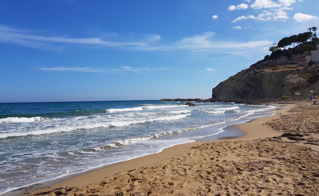 Photo de Cala lanuza avec sable brun de surface