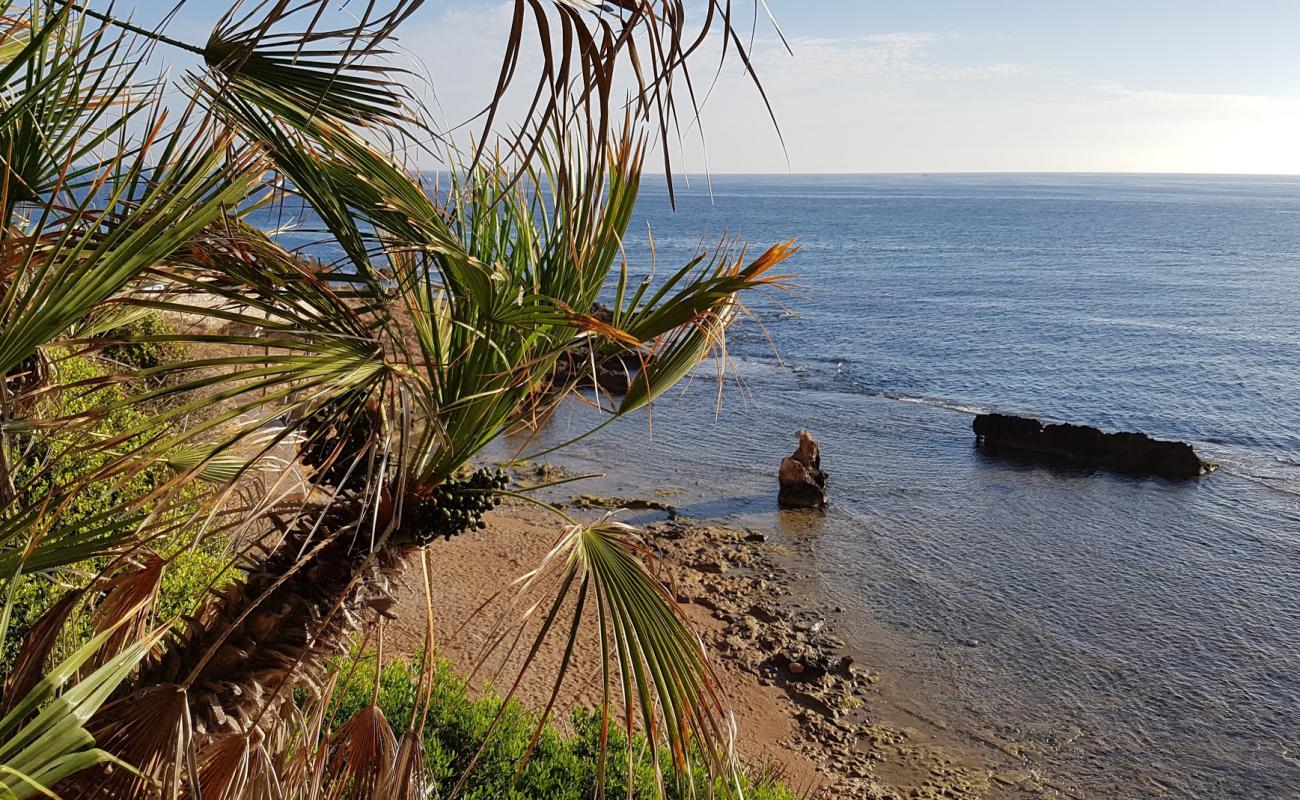 Photo de Playa les rotes denia avec sable brun de surface