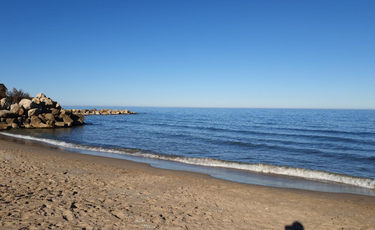 Photo de Playa el Marenyet avec sable brun de surface