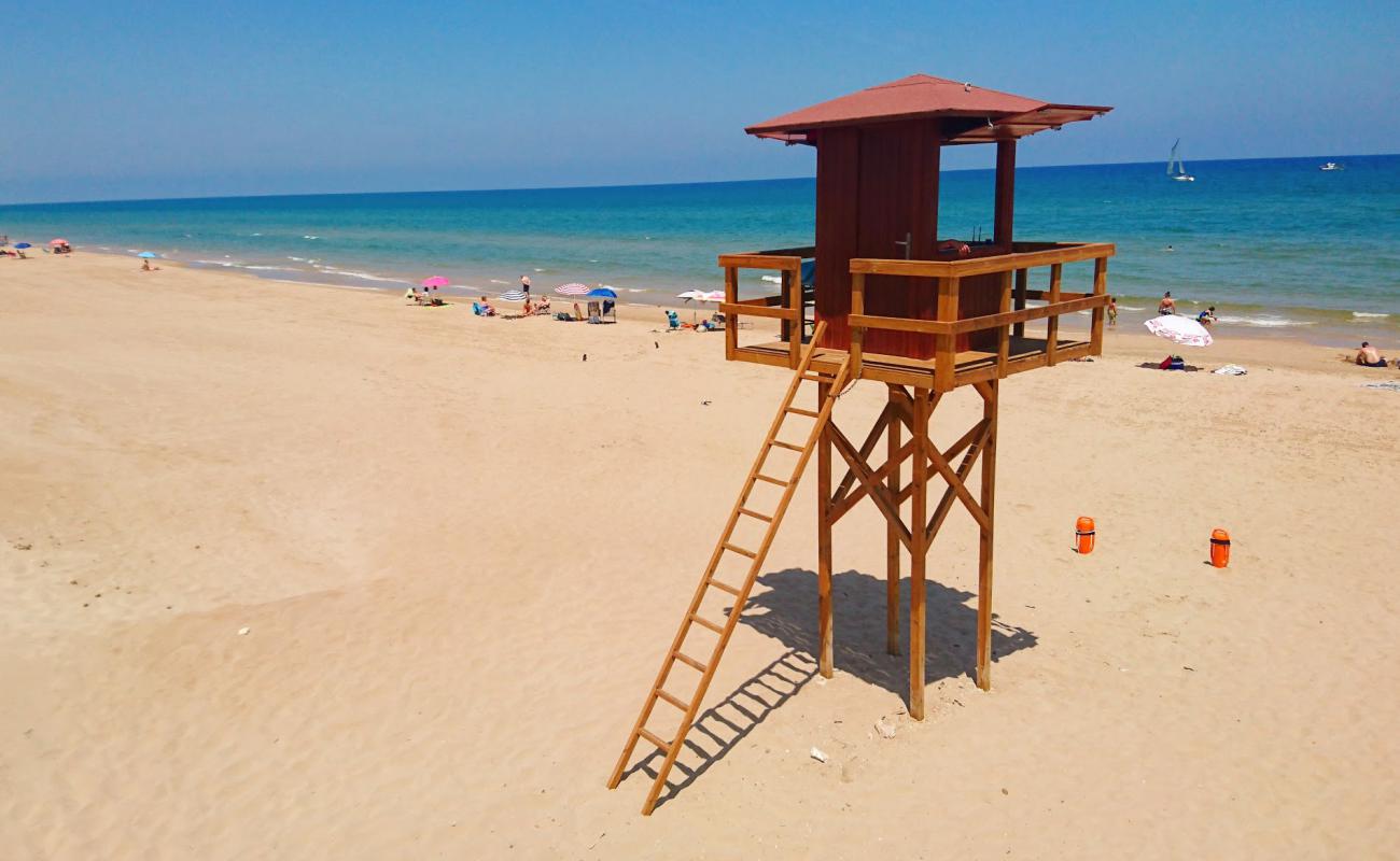 Photo de Cullera Naturista avec sable brun de surface