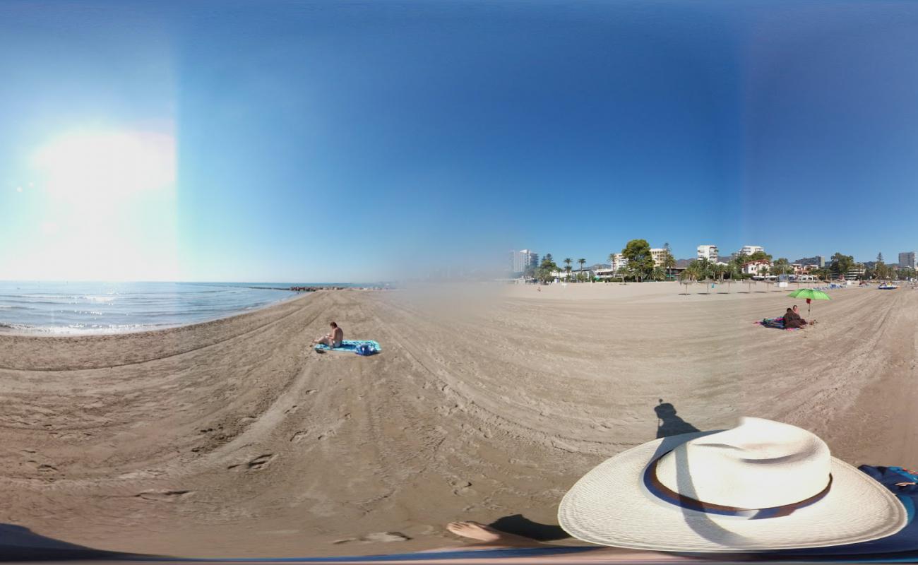 Photo de Playa del Torreon avec sable brun de surface