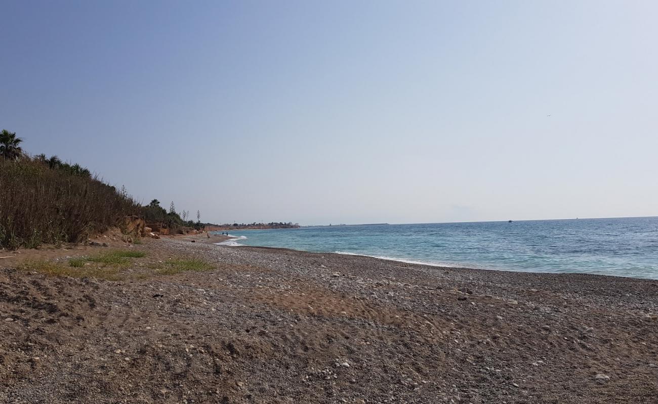 Photo de Playa Perrochos avec caillou gris de surface