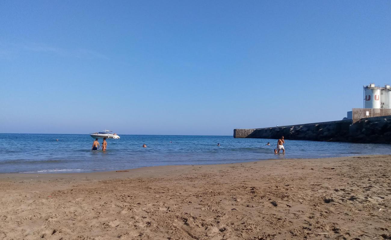 Photo de Cala Vallcarca avec sable brun de surface