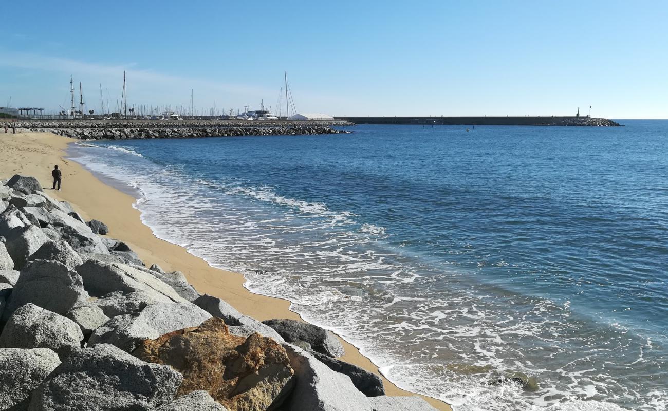 Photo de Platja de Ponent avec sable beige de surface