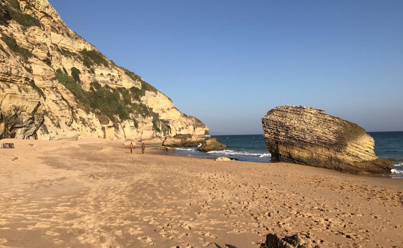 Photo de Playa de la Cortina avec sable fin et lumineux de surface