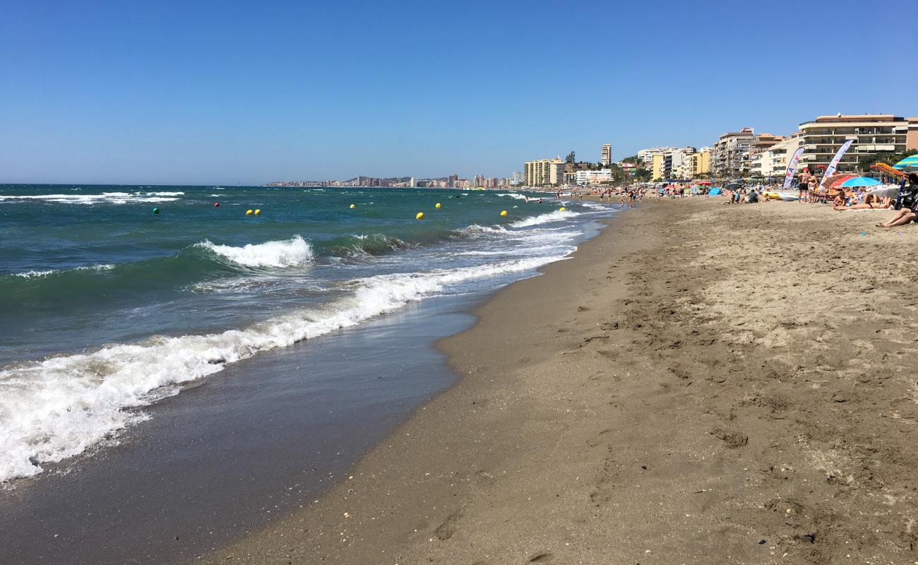 Photo de Playa de Carvajal avec sable gris de surface