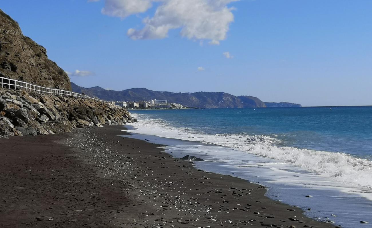 Photo de Playa Calaceite avec sable gris de surface